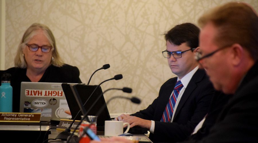 Coastal Resources Commission legal counsel Mary Lucasse, left, is seated next to new commission member Jordan Hennessy Thursday during the commission's meeting in Beaufort. Photo: Mark Hibbs