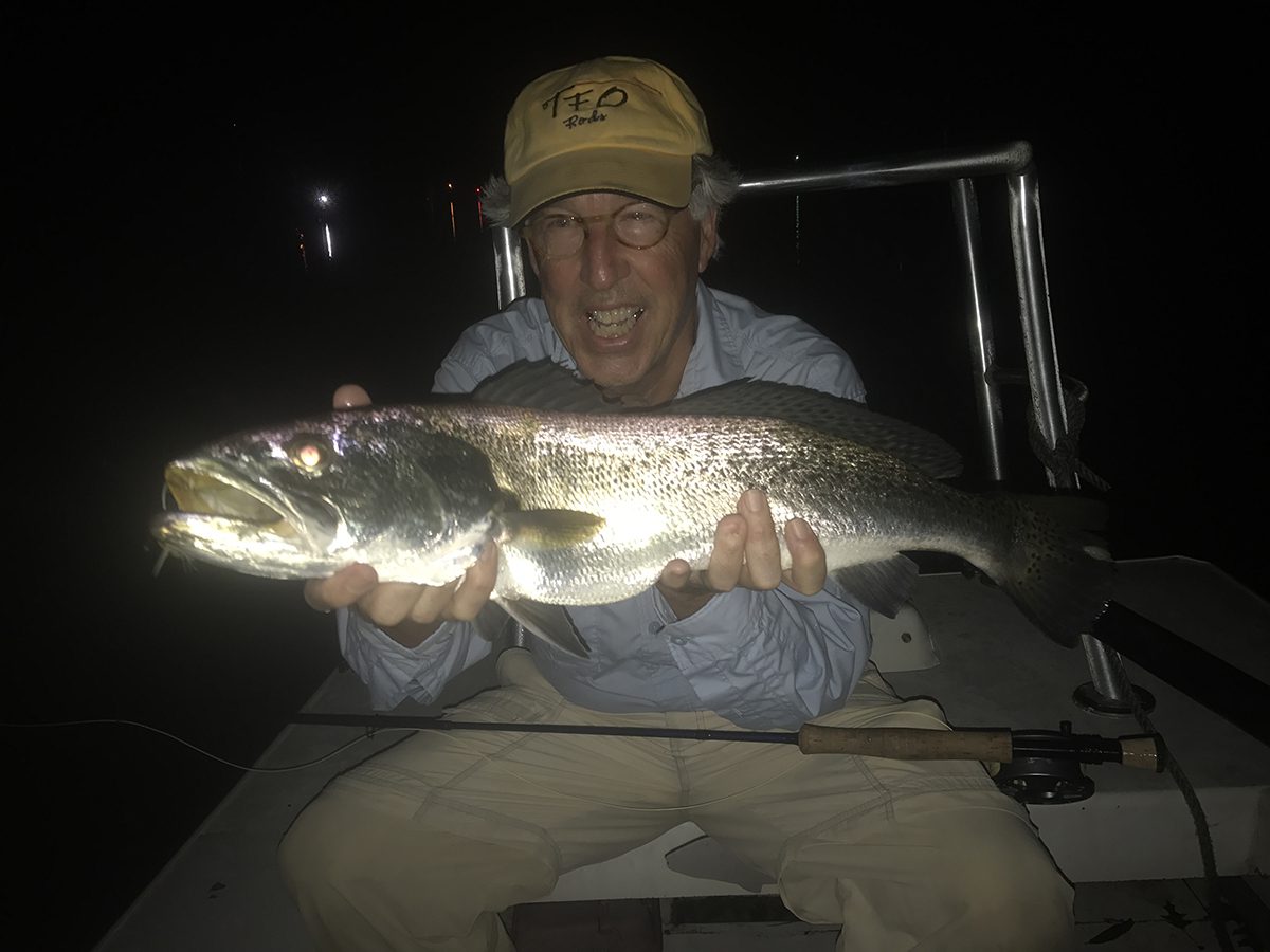 Rip Woodin shows off a big trout that came out at night. Photo: Gordon Churchill